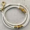 White kangaroo show lead with Gold beads