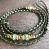 Olive, Fern Green & Gold kangaroo slip show lead with Green & Gold beads